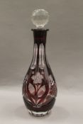 A Bohemian ruby flash glass decanter. 32 cm high.