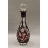 A Bohemian ruby flash glass decanter. 32 cm high.