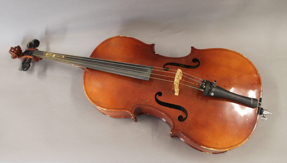 A cello. Approximately 107 cm high.