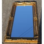 A large gilt mirror