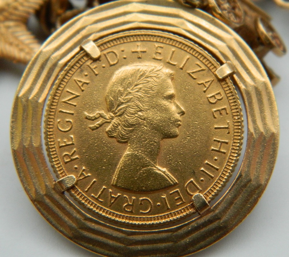 A 9 ct gold charm bracelet, set with various gold coins, including two sovereigns. 218. - Image 12 of 20