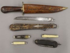 A collection of various vintage knives