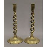 A pair of brass open twist candlesticks. 30 cm high.