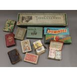 A quantity of vintage playing cards and games.