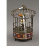 A birdcage clock. 20 cm high.