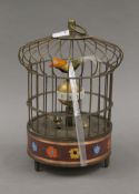 A birdcage clock. 20 cm high.