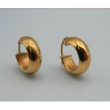 A pair of 9 ct gold earrings, boxed. 2.3 grammes.