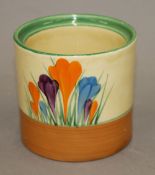 A Clarice Cliff Crocus pattern pot. 7.5 cm high.