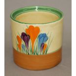 A Clarice Cliff Crocus pattern pot. 7.5 cm high.