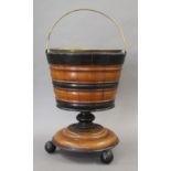 A 19th century Dutch wooden coal bucket. 40 cm high.