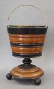 A 19th century Dutch wooden coal bucket. 40 cm high.