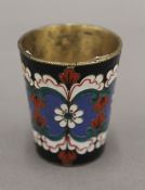 A Russian silver enamel vodka tot. 4.5 cm high.