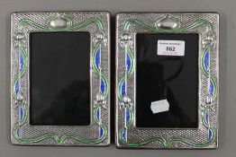 A pair of Art Nouveau style silver photograph frames. 14.5 x 19 cm.