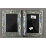 A pair of Art Nouveau style silver photograph frames. 14.5 x 19 cm.