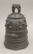 A 19th century Tibetan bronze temple bell. 19 cm high.