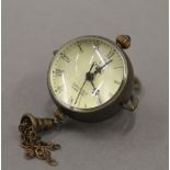 A pendant ball watch. 3 cm wide.