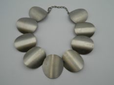 An ExNoVo handmade Greek designer metal necklace. Approximately 36 cm long.