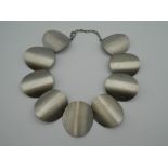 An ExNoVo handmade Greek designer metal necklace. Approximately 36 cm long.