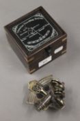 A boxed model sextant. The box 11 cm wide.