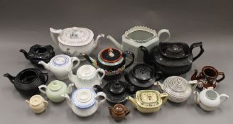 A collection of 19th century porcelain teapots