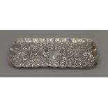 A silver tray, hallmarked 1892, maker's mark of William Comyns. 24 cm wide. 4.1 troy ounces.