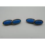 A pair of vintage enamel cufflinks. 1.5 cm wide.