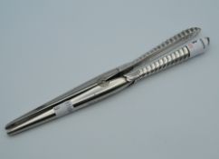 A pair of silver handled glove stretchers. 20 cm long.