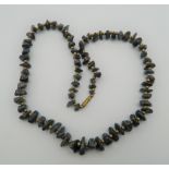A sodalite necklace. 55 cm long.