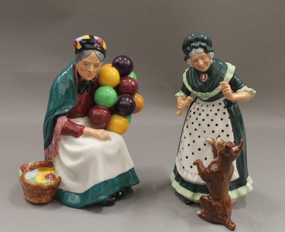 Two Royal Doulton figurines, The Old Balloon Seller HN1315 and Old Mother Hubbard HN2314.