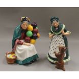 Two Royal Doulton figurines, The Old Balloon Seller HN1315 and Old Mother Hubbard HN2314.