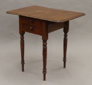 A Victorian mahogany Pembroke work table. 40.5 cm wide flaps down.