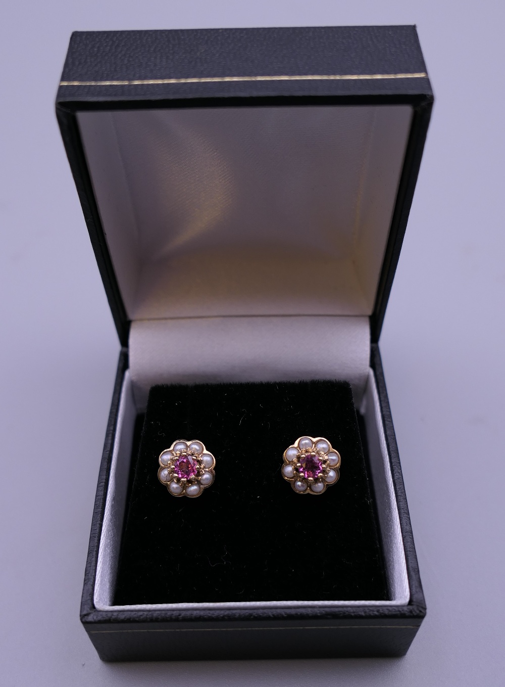 A pair of 9 ct gold pink tourmaline and pearl earrings. 8 mm high.