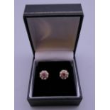 A pair of 9 ct gold pink tourmaline and pearl earrings. 8 mm high.