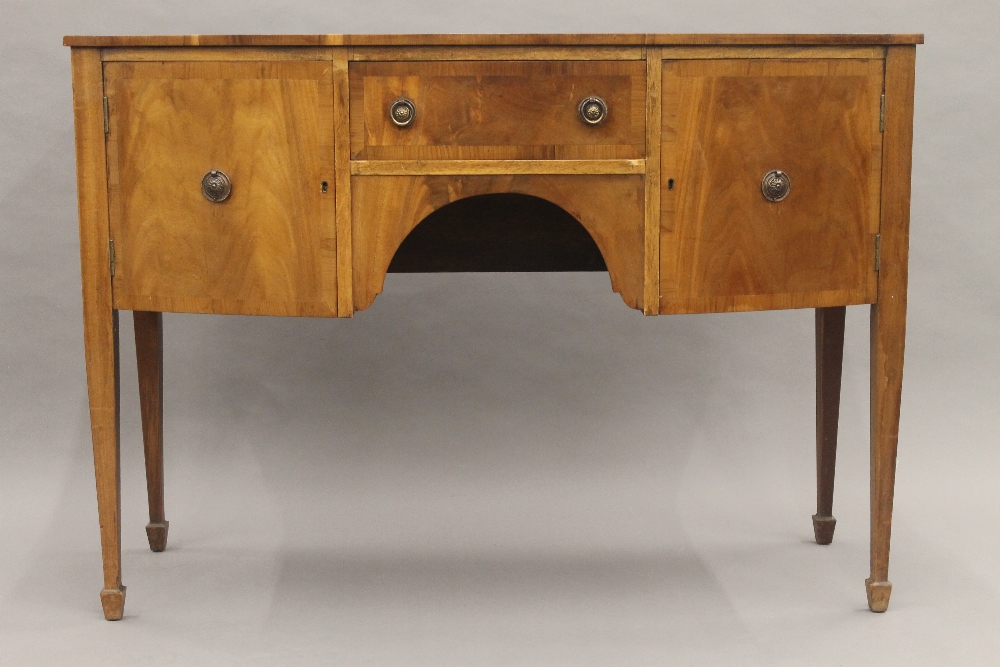 A 19th century style mahogany bow front sideboard. 123 cm wide.