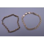 Two 9 ct gold bracelets. 8.1 grammes.