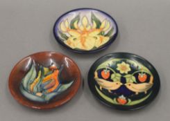 Three small modern Moorcroft dishes. Each approximately 11.5 cm diameter.