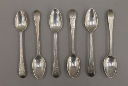 A set of six Georgian bright cut silver teaspoons. 61.2 grammes.