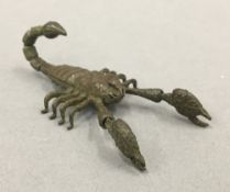 A bronze model of a scorpion. 8.5 cm long.