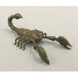 A bronze model of a scorpion. 8.5 cm long.