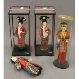 Four various Chinese dolls. The largest 28 cm high.