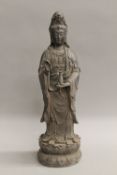 A bronze figure of Guanyin. 37 cm high.