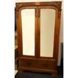 A Victorian Arts and Crafts wardrobe. 120 cm wide x 202 cm high.