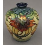 A large modern Moorcroft bulbous vase. 16.5 cm high.