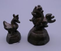 Two Burmese cast bronze chicken form opium weights. The largest 5.5 cm high.