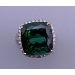 A 14 ct gold tourmaline and diamond ring. Ring size K. 10 grammes total weight.