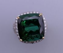 A 14 ct gold tourmaline and diamond ring. Ring size K. 10 grammes total weight.