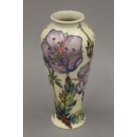 A modern Moorcroft slender vase. 20 cm high.