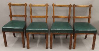 A set of four Victorian oak dining chairs