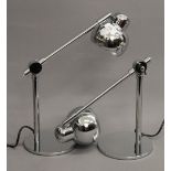 A pair of chrome angelpoise lamps