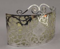 A sterling silver screen. 28 cm wide. 13.3 troy ounces total weight.